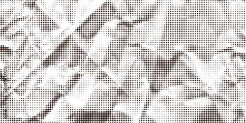 Abstract archival beige brown crumpled paper halftone textured background. Modern dotted texture of old dark and light wrinkled sheet texture for retro business design, banner, vintage shadow surface