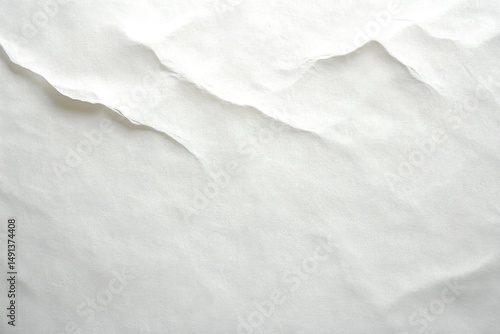 close-up view of light-colored textured paper with subtle cracks and gentle creases creating delicate shadows and highlights