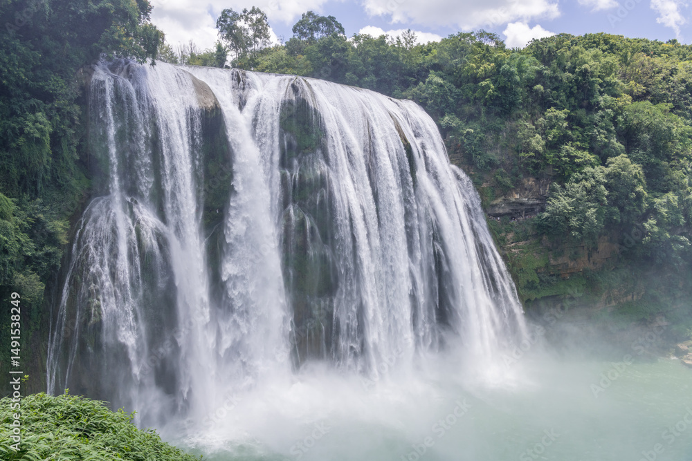 Fototapeta premium The Huangguoshu waterfall in Anshun, Guizhou, China. Long exposure photography.