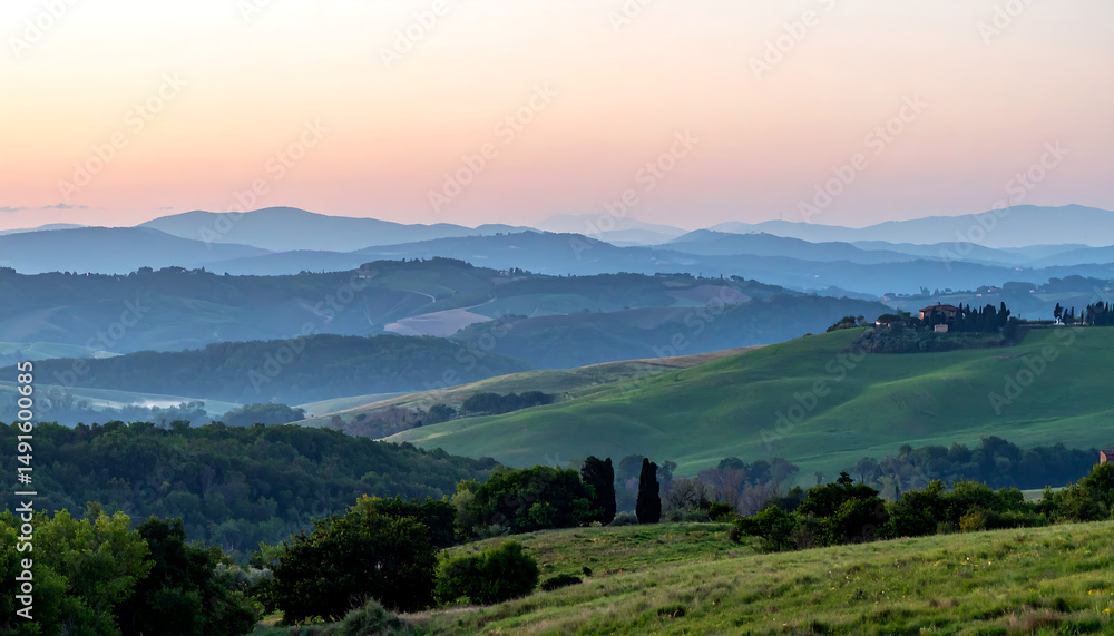 Fototapeta premium Beautiful rolling hills with lush greenery under a colorful sunrise sky