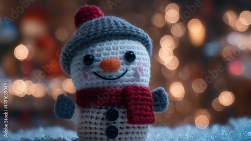 Wallpaper Mural Small crocheted snowman with red scarf and hat on white background, perfect for winter and holiday themes. Torontodigital.ca