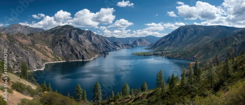 Fototapeta Naklejka Na Ścianę i Meble -  Scenic Panorama of Lake Chelan Washington State USA from High Angle View with Mountains and Clouds on a Sunny Day in the Pacific Northwest