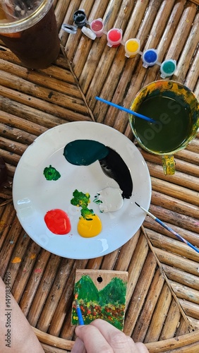 color paint art on white dish for painting art