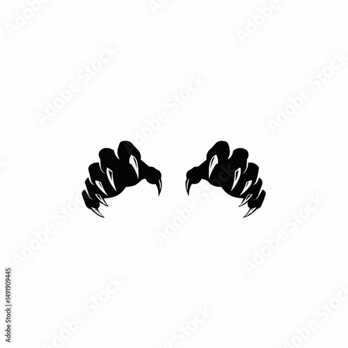 Silhouette of monster claws on a white background, menacing and stark contrast