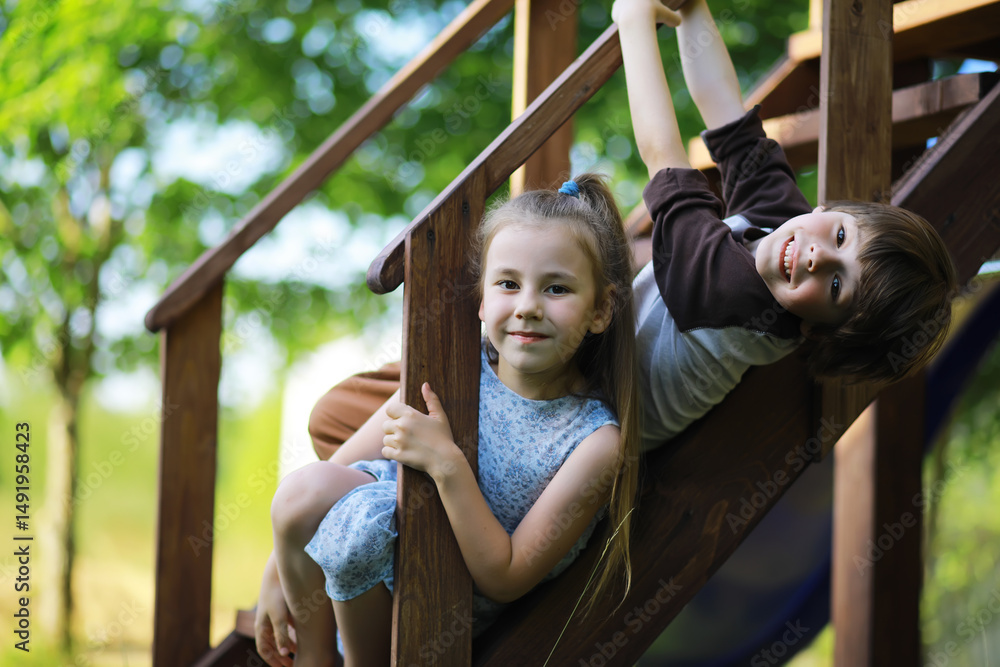 Obraz premium Children walk in the summer in nature. Child on a sunny spring morning in the park. Traveling with children.