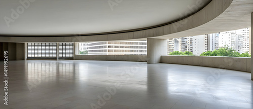 Empty Modern Concrete Building Interior With City View