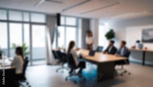 having a meeting in a blurry office, the atmosphere of a group of people having a meeting in a natural-themed, modern office with a wooden table, with a blurry office background