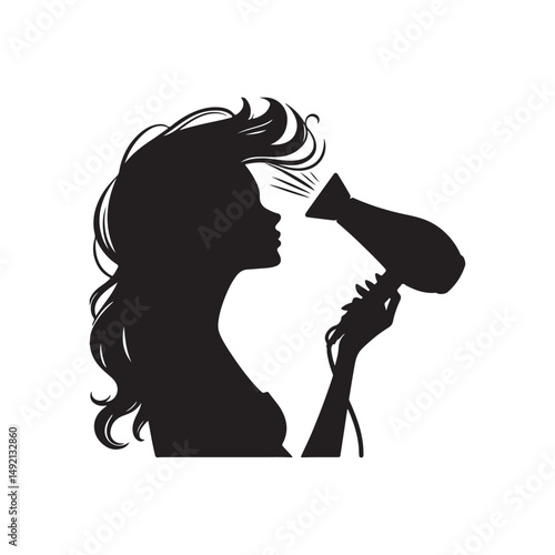 woman drying her hair