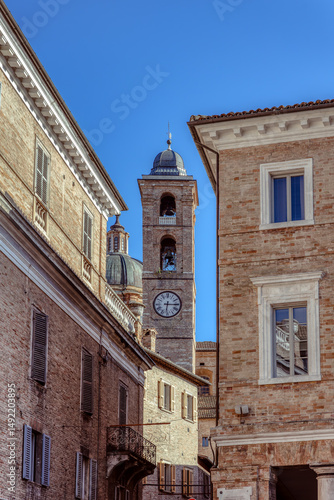 Palace of the Dukes of Urbino - Palazzo Ducale di Urbino. Medieval architecture in the Palace of the Dukes of Urbino in Marche, Italy under the clear blue sky