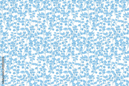 Seamless vector pattern of blue floral branches on a white background. Elegant and romantic design ideal for textiles, wallpapers, packaging, and botanical themed projects