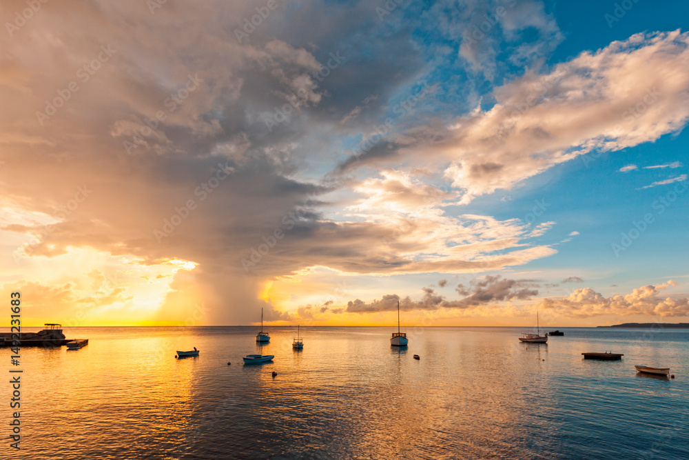 Naklejka premium Impressing cloudscape during sunset at Saint Michiel, Curaçao