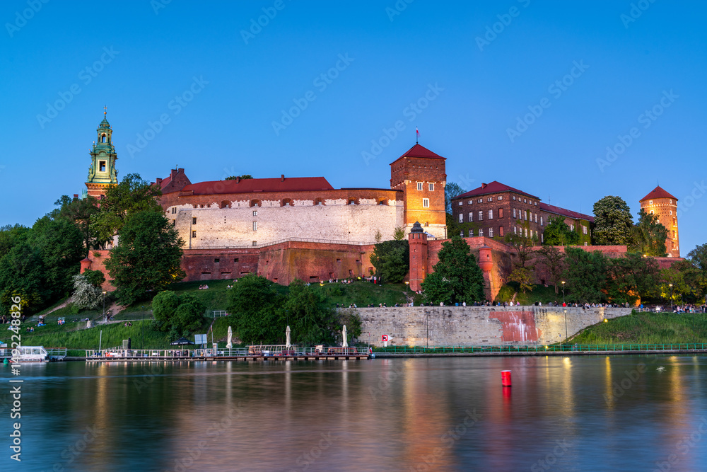 Fototapeta premium Evening View of Wawel Castle Reflected in Vistula Waters in Cracow , Poland