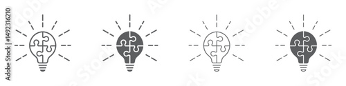 Set of light bulb puzzle icons. Lamp symbol with jigsaw inside. Business concept, idea, strategy. Four puzzle pieces with light bulbs. Vector illustration.