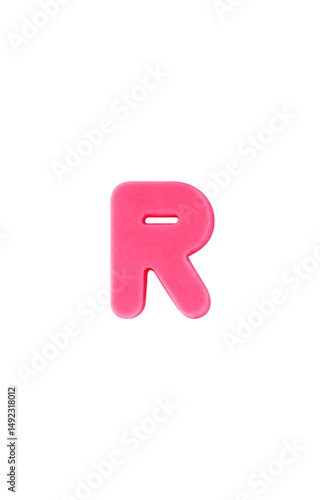 Colored clay shaped like the English letter R. Pink color