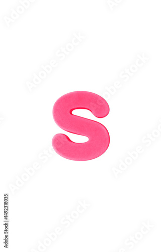 Colored clay shaped like the English letter S. Pink color