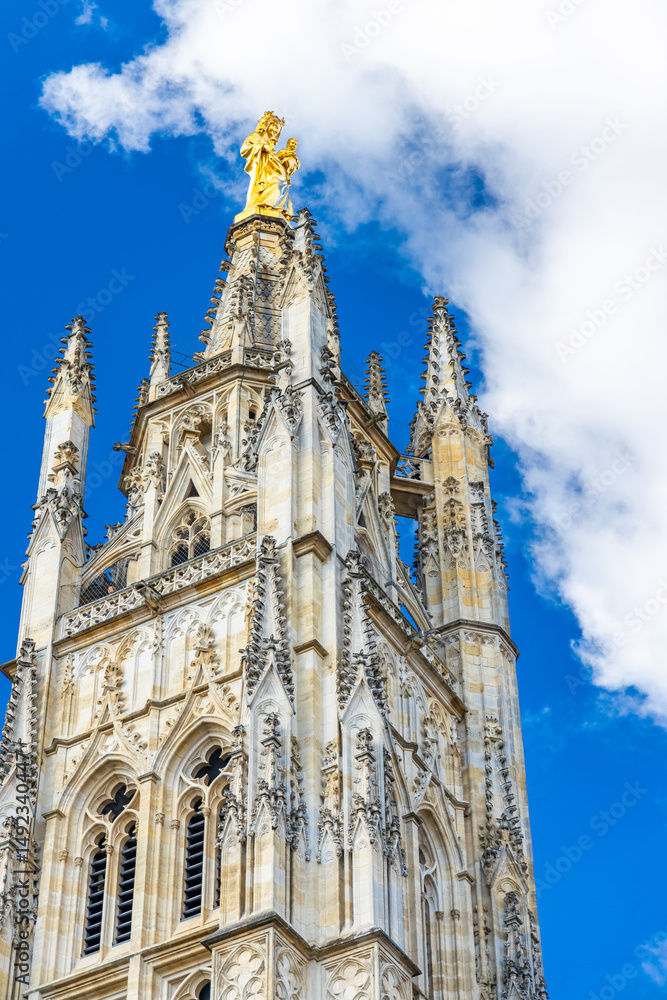 Fototapeta premium Low angle view of the top of Tour Pey Berland tower in Bordeaux, France