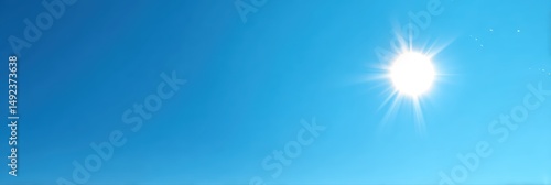 Bright Blue Sky with Radiant Midday Sun is a professional-grade stock image suitable for editorial use, social storytelling, cultural representation, and marketing visuals.
