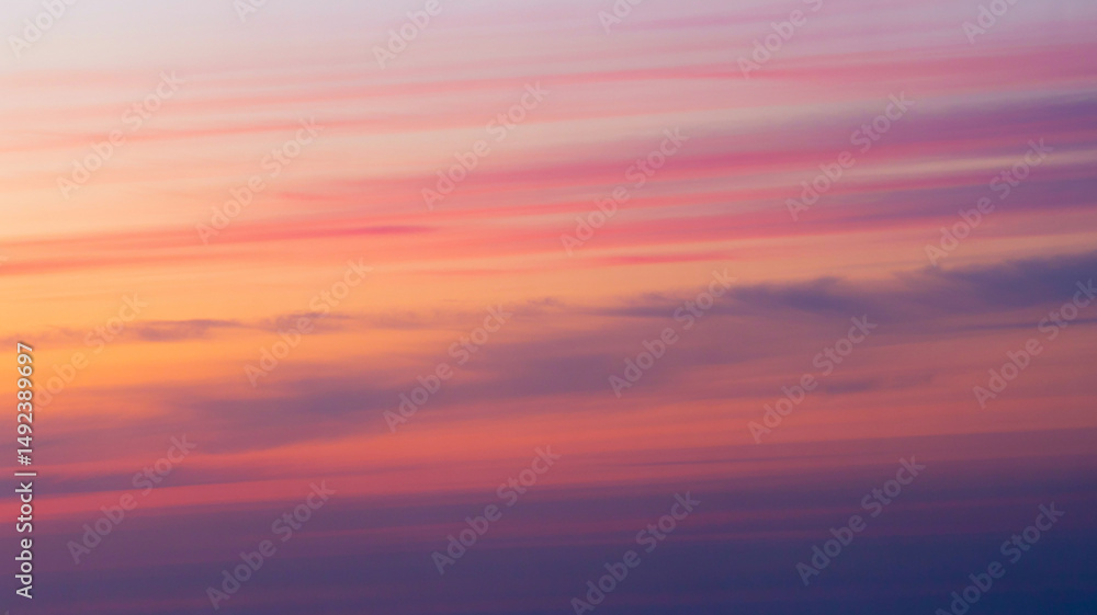 Obraz premium Serene sunset sky pastel hues soft cloudscape