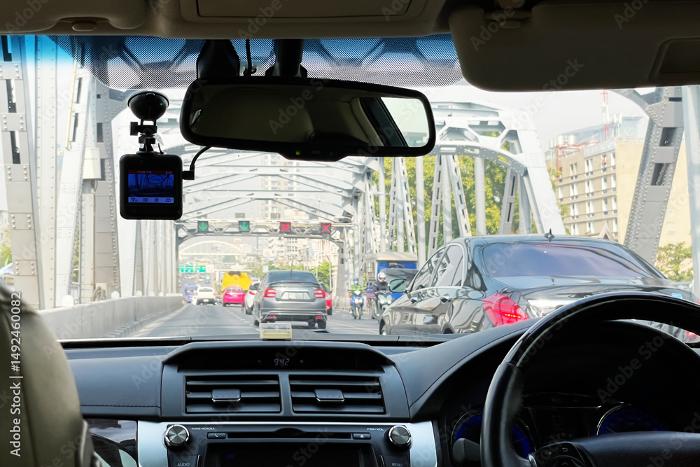 Obraz premium View from inside of the car show traffic ahead while driving across the bridge on the road of Bangkok Thailand.Image use for holiday travel presentation background. 