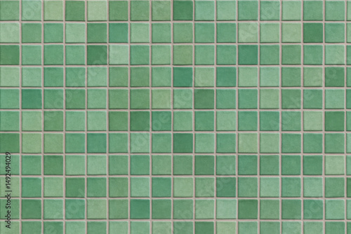 Green Mosaic Tile Pattern: A visually appealing array of small, square green tiles create a textured surface, perfect for various design applications, presenting a unique aesthetic with its seamless.