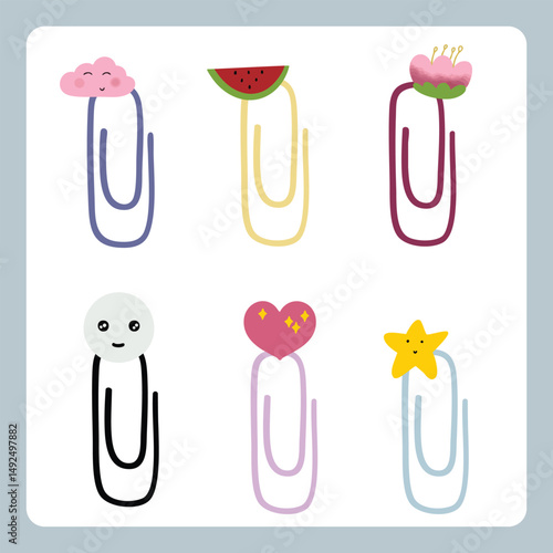 Set of cute paper clips with cute decorative elements for scrapbook