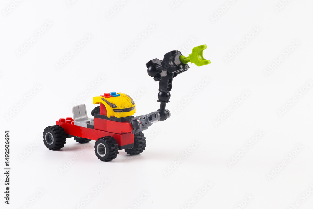 Obraz premium Colorful bricks construction vehicle toy that developes creativity and imagination.