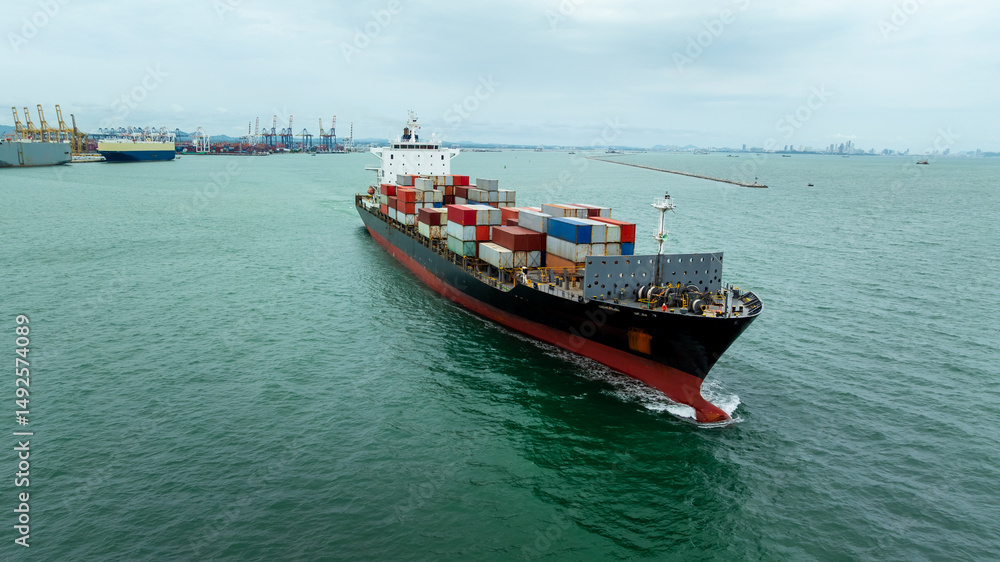 container ship carrying goods for international import export, business and industry regarding cargo transportation services to consumers and dealers by container ship around the world,