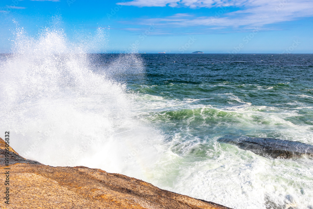 Fototapeta premium Ipanema Beach Water Waves and Rocks Rio de Janeiro Brazil.