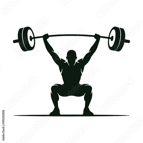 Powerful Silhouette of a Weightlifter Performing an Overhead Squat