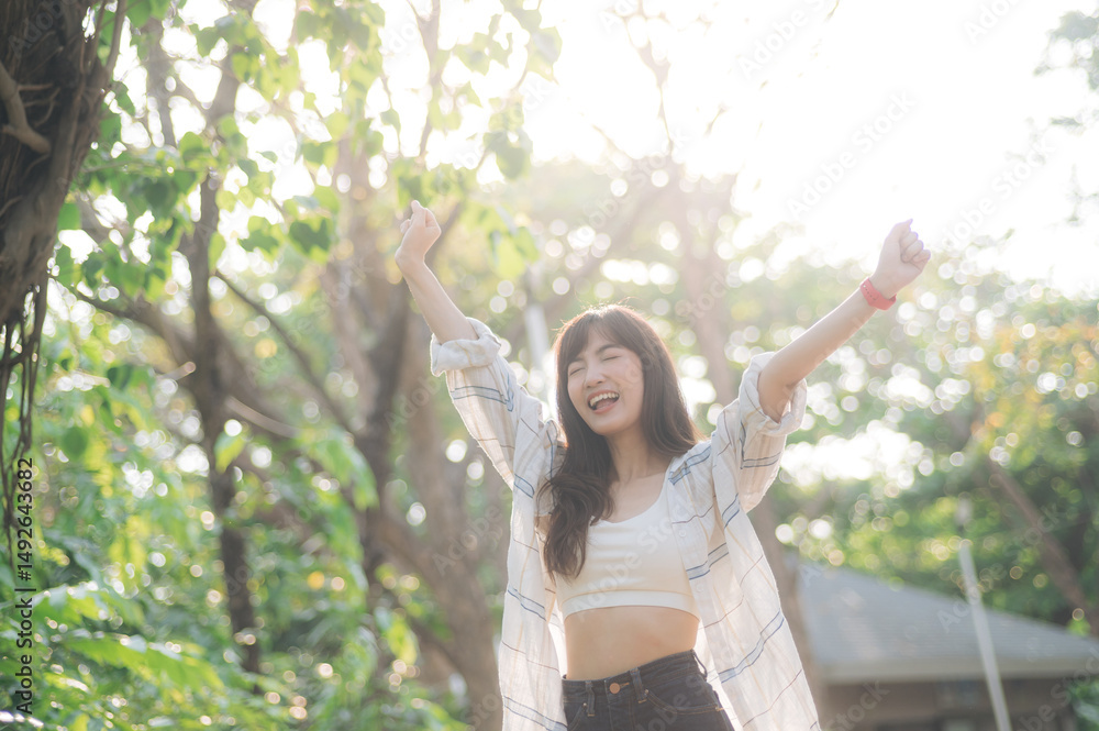 Southeast asian female young woman enjoying refreshing deep breath in public park expressing wellness and embracing healthy lifestyle with joy and positivity Southeast asian female young woman enjoying refreshing deep breath in public park expressing wellness and embracing healthy lifestyle with joy and positivity