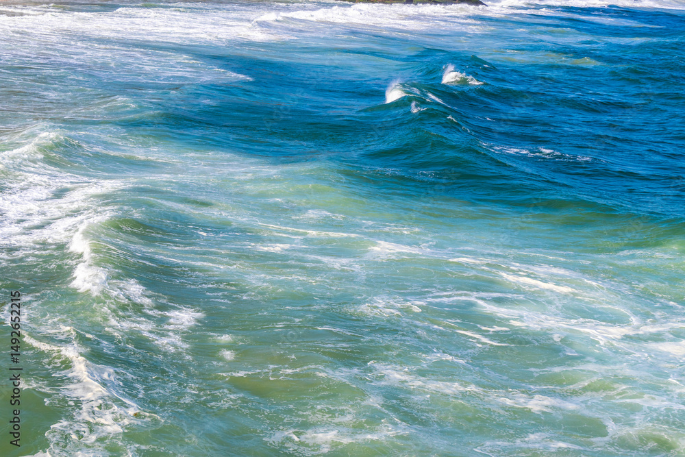 Fototapeta premium Ipanema Beach Water Waves and Rocks Rio de Janeiro Brazil.