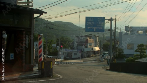 Peaceful Japanese village street at golden hour.
