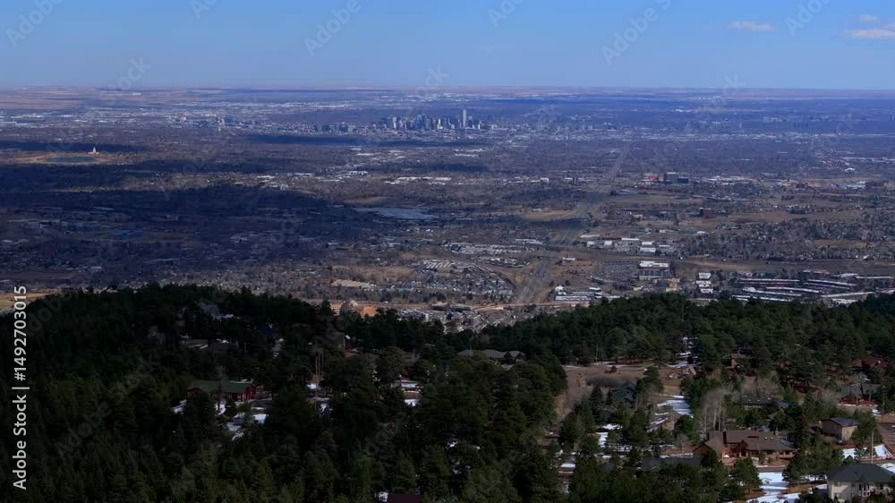 Lookout Mountain Golden Colorado aerial drone Downtown Denver cityscape from North Table Mesa daytime winter sunny clouds neighborhood Front Range Rocky Mountains Arvada Lakewood parallax right motion Lookout Mountain Golden Colorado aerial drone Downtown Denver cityscape from North Table Mesa daytime winter sunny clouds neighborhood Front Range Rocky Mountains Arvada Lakewood parallax right motion