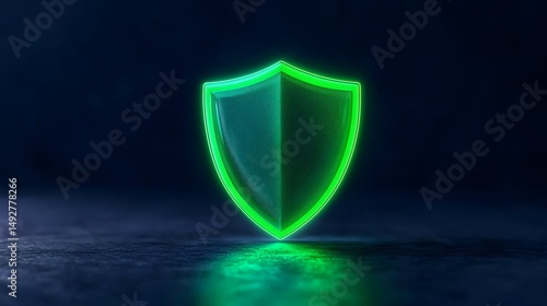 Glowing green shield icon on dark surface, reflecting light, signifying protection and security