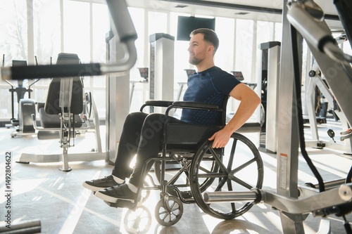 Wallpaper Mural Man with disability training in wheelchair at gym for rehabilitation Torontodigital.ca