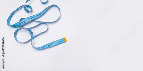 Fotografia Measuring tape, centimeter on gray background