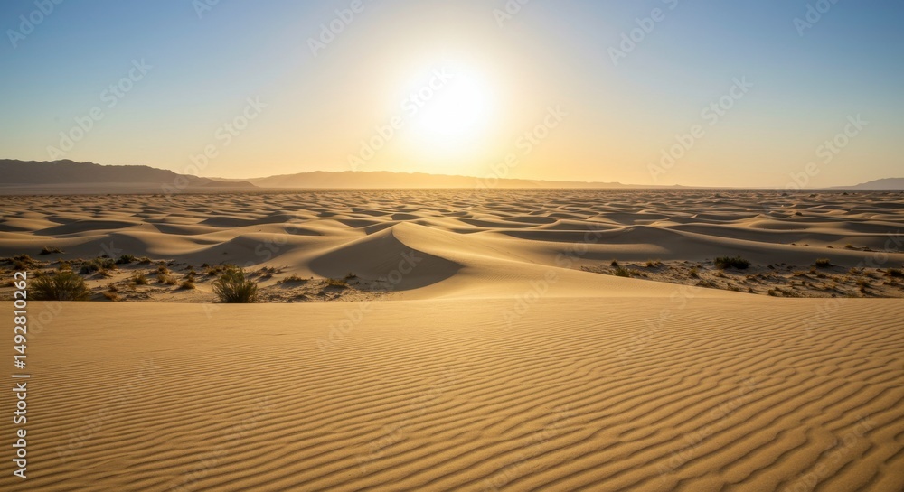 Naklejka premium Majestic Desert Sunset Rolling Sand Dunes Landscape at Golden Hour