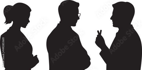 Silhouette of Three Business People in Conversation