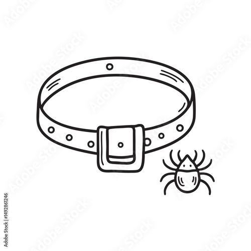 A tick crawling beside a dog collar on the floor
