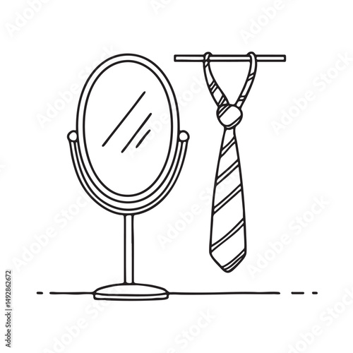A tie hanging on hook beside a mirror