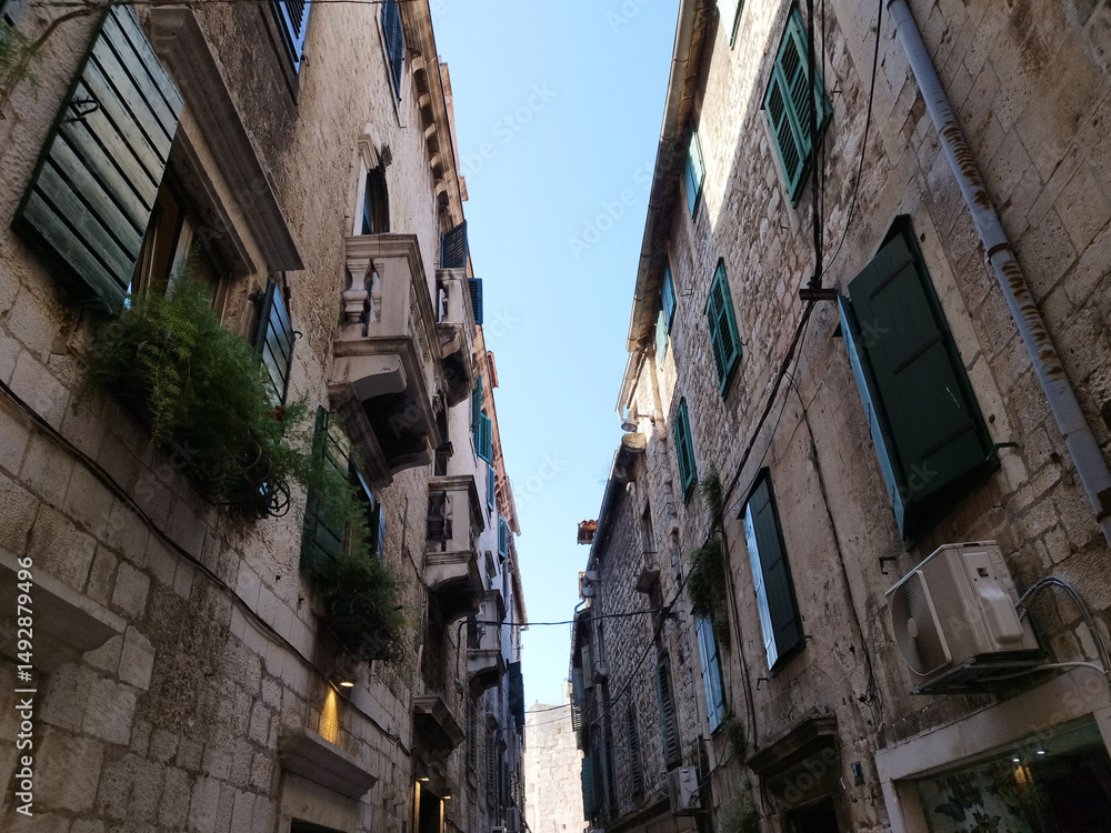 Ancient streets of Europe. Yellow stone houses. Split city in Croatia. Ancient streets of Europe. Yellow stone houses. Split city in Croatia.