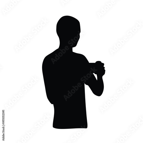Silhouette of a person, a man with a gun or a dancing boy, casting a black shadow outline