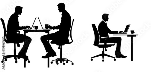 A man is seated in an office chair at his desk with a laptop and coffee cup in silhouette