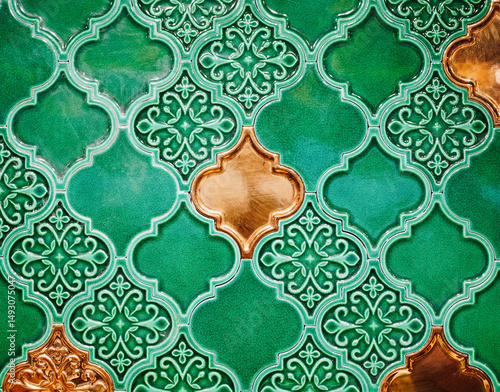 Green Tiles Background. Top view of beautiful luxury vintage green and gold tiles, islamic style backdrop pattern background.
