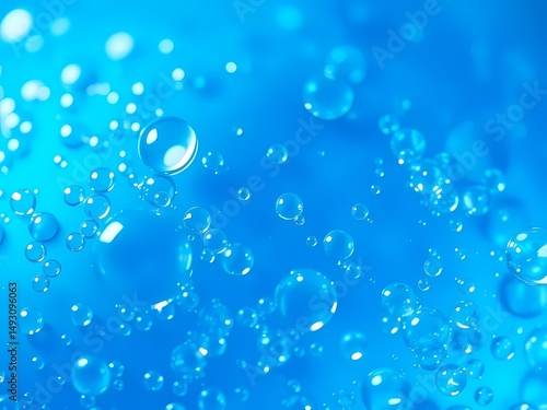 Wallpaper Mural Shimmering blue bubble texture catches light with subtle translucent reflections, creating a dynamic background. Torontodigital.ca