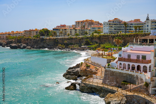 Obraz na plátně Playa la Caletilla in Nerja, a seaside resort town on the Costa del Sol along th