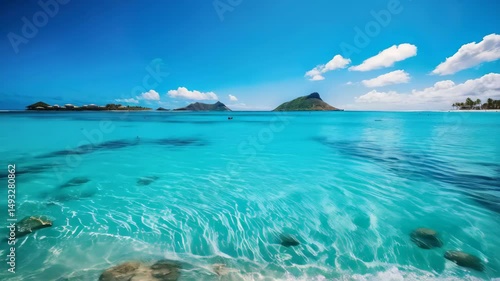 A serene tropical landscape featuring clear blue waters and distant green hills under a bright sky.