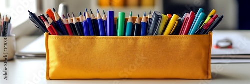 Colorful art supplies pencil case on desk photography study supplies writing painting drawing