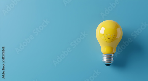 Yellow Lightbulb Illuminated On Blue Backdrop Representing Innovative And Creative Ideas In A Bright Concept