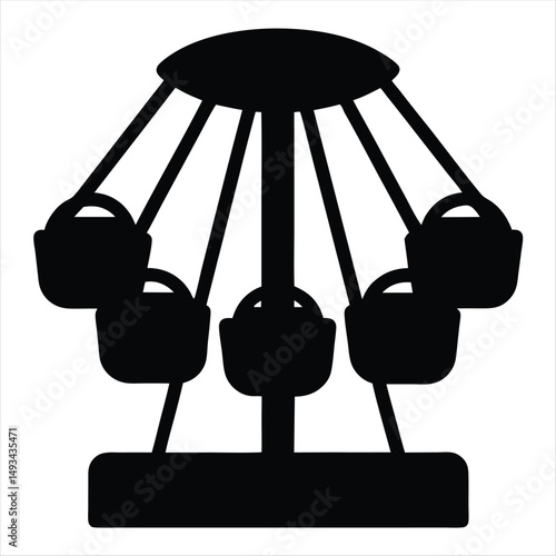 Silhouette of a carnival ride with dangling chairs for park fun
